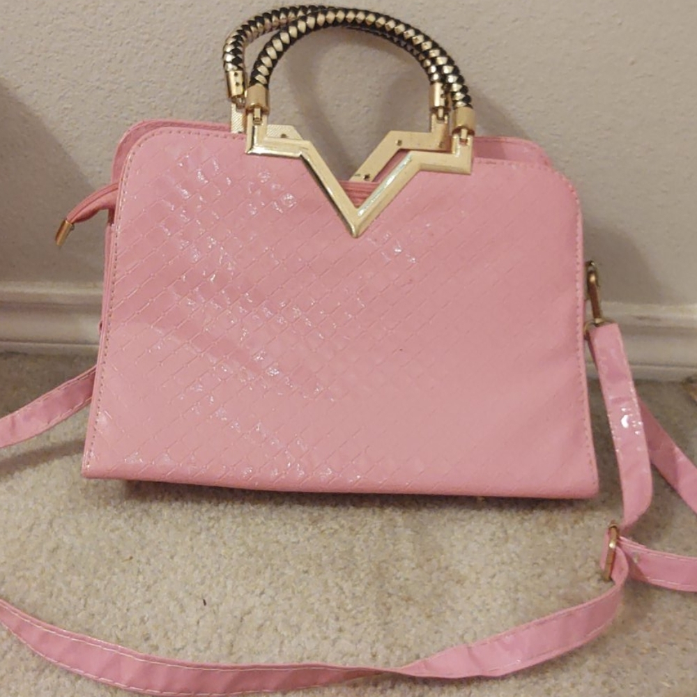 A non used pink purse